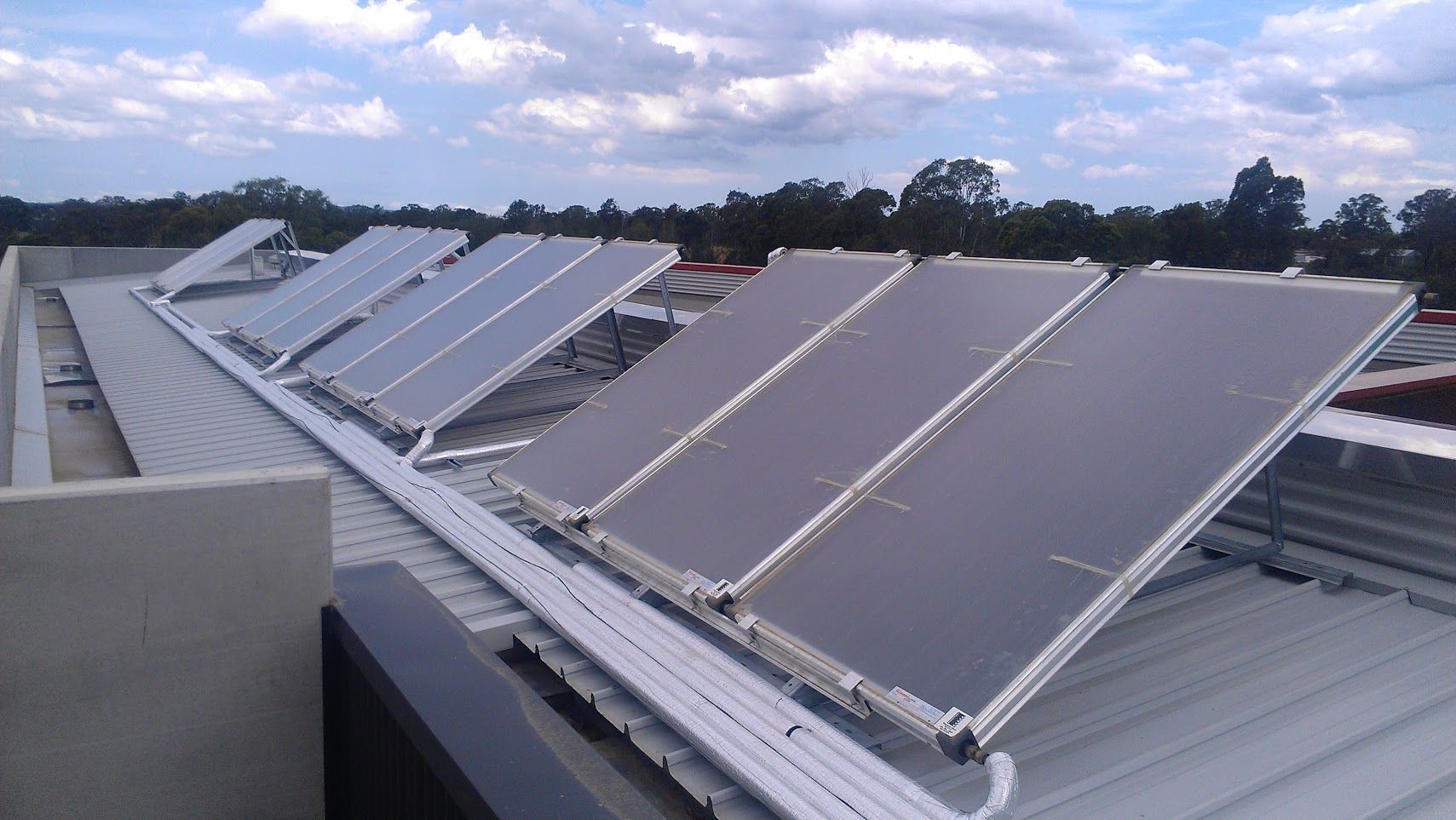 a roof with a lot of solar panels on it