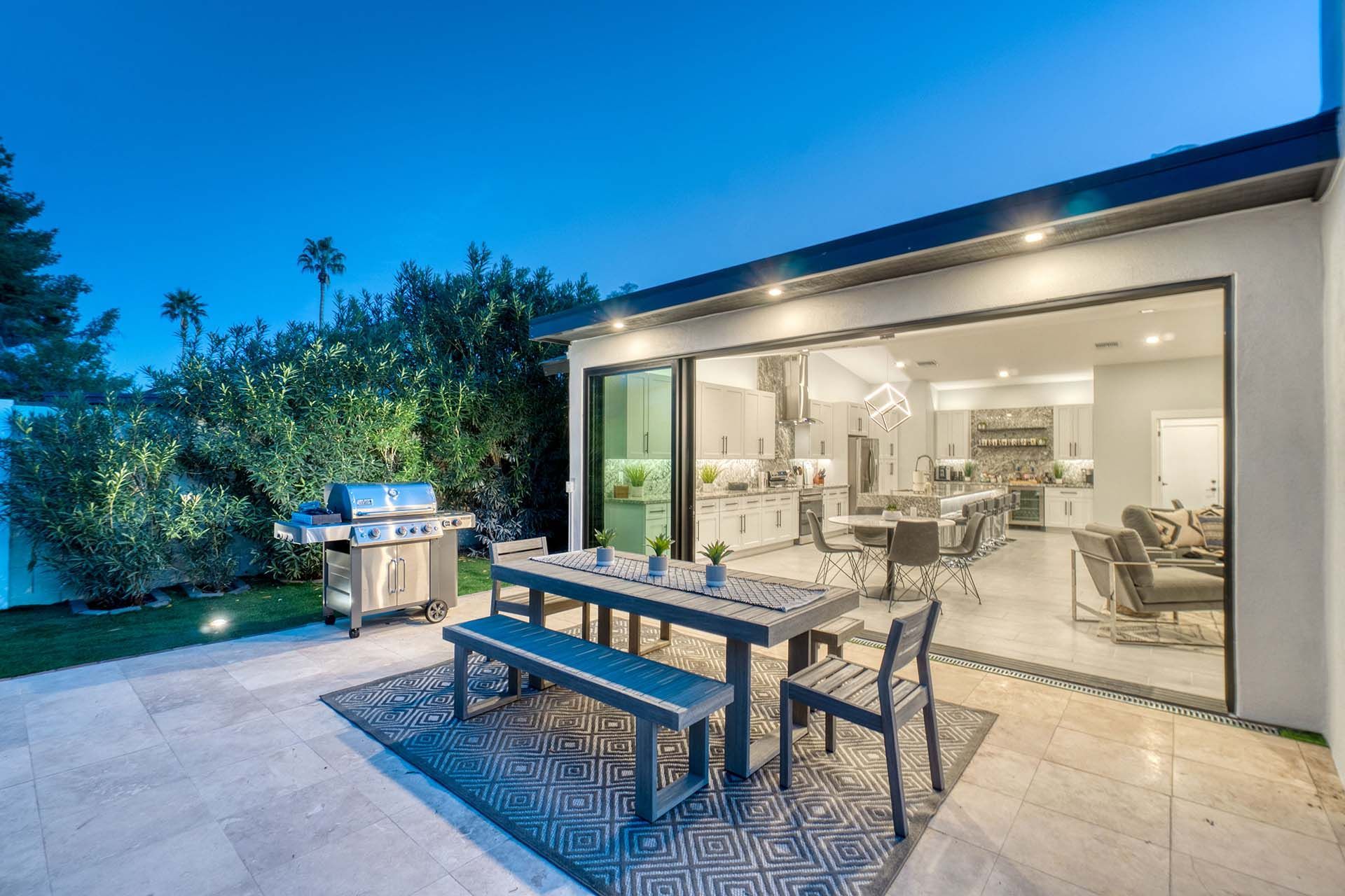 A luxurious back patio with a sliding glass door from a security door supplier. A luxurious back patio with a sliding glass door from a security door supplier.