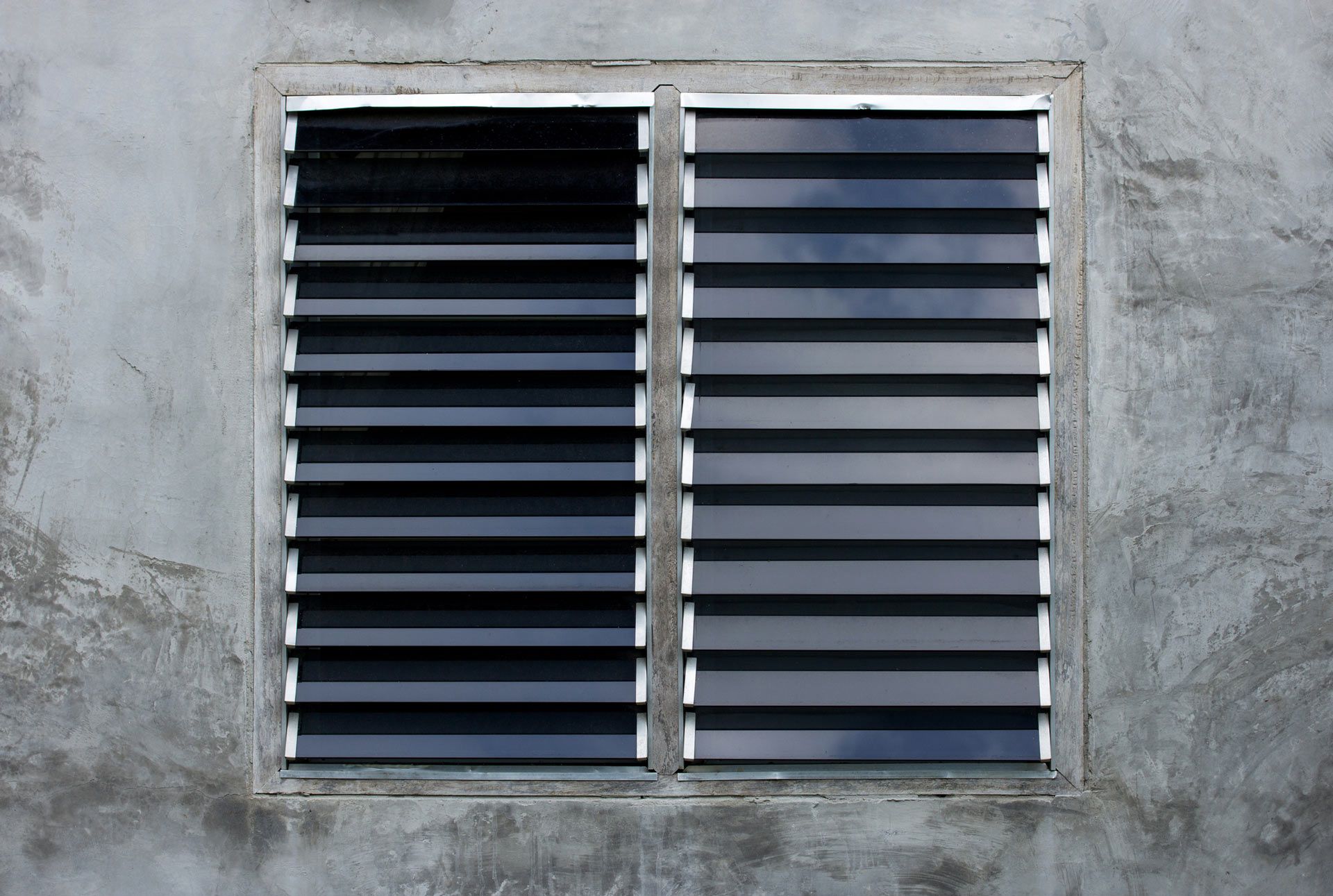 Louver Window on Gray Concrete Wall | Port Pirie, Sa | Johnson Home Improvements