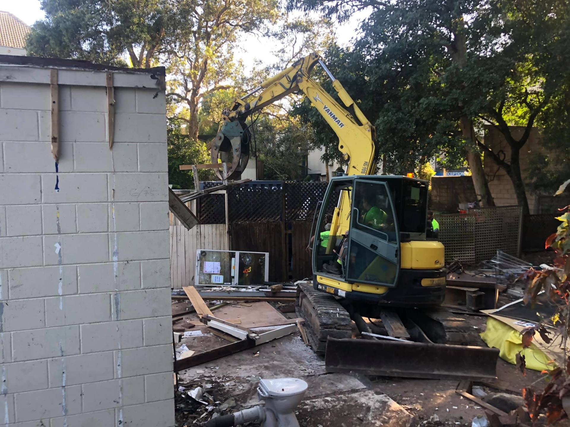 An Excavator On A Residential Demolition site on the Sunshine Coast — Allcoast Group Demolition Contractors from Residential Demolition Group
