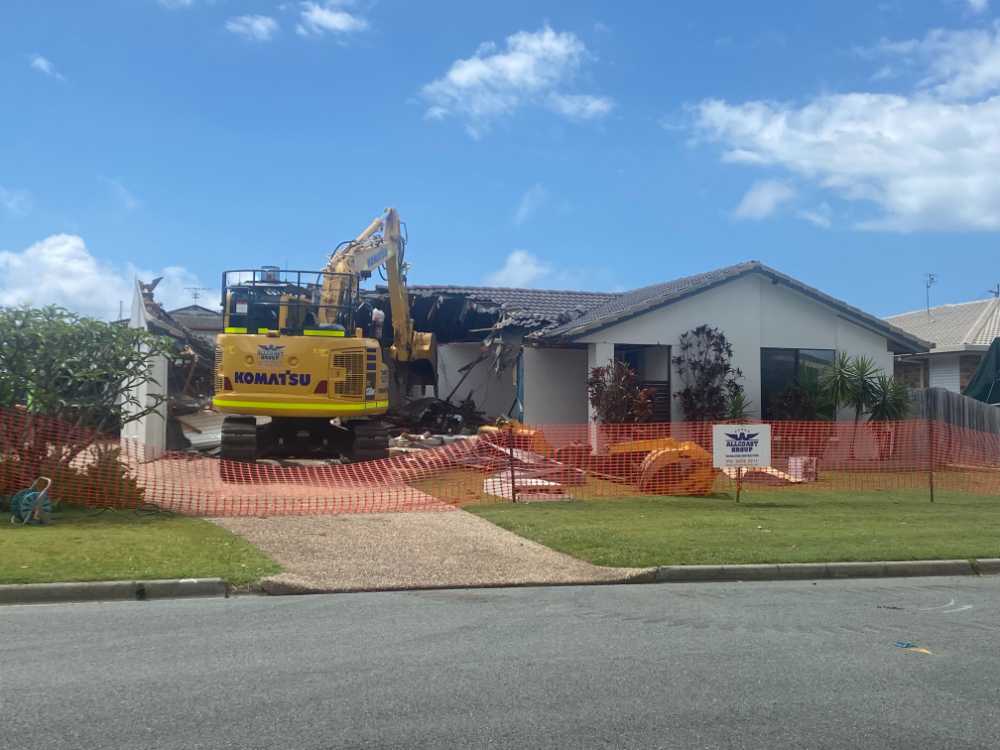 An Excavator On A Residential Demolition site on the Sunshine Coast  — Allcoast Group Demolition Contractors from Residential Demolition Group