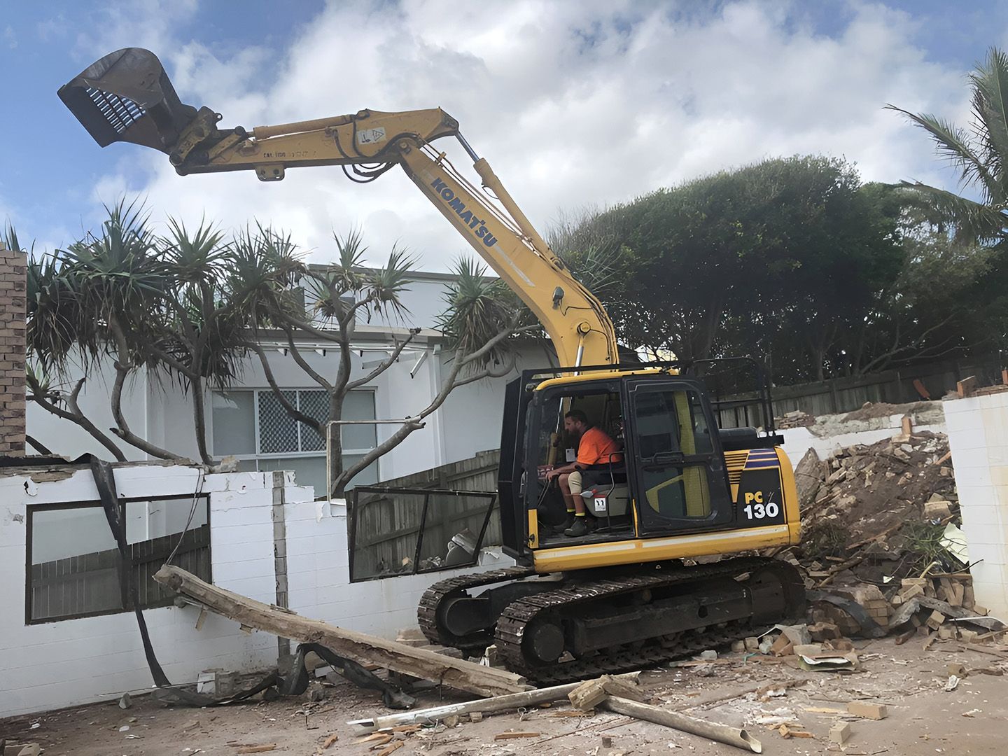Excavator Performing Residential Demolition