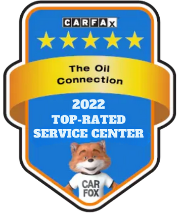 CARFAX Top-Rated Service Center award logo, with a fox mascot wearing a CARFAX shirt, gold and blue.