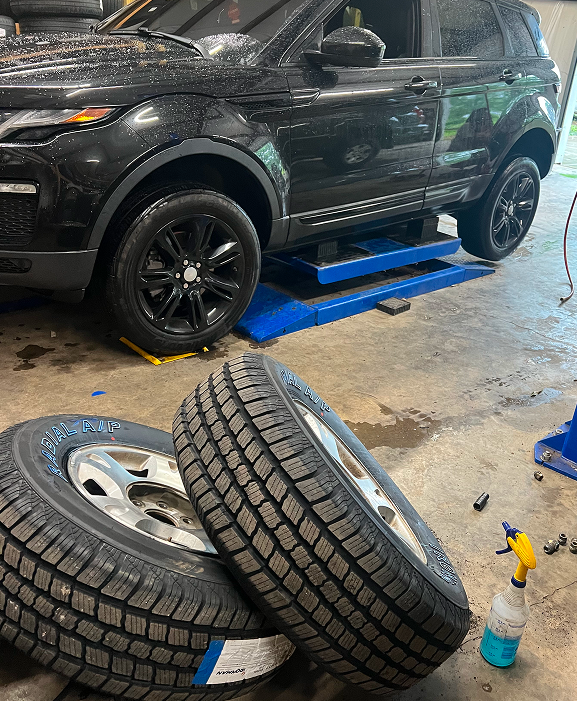Tires and a car | Wholesale Auto Center West Point
