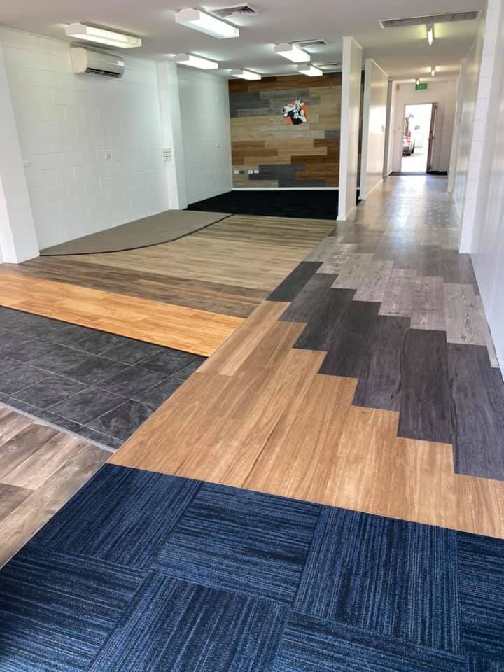 Room With Floor Samples: Various Wood And Carpet Tiles — Mareeba Floor Covering Centre in Mareeba, QLD