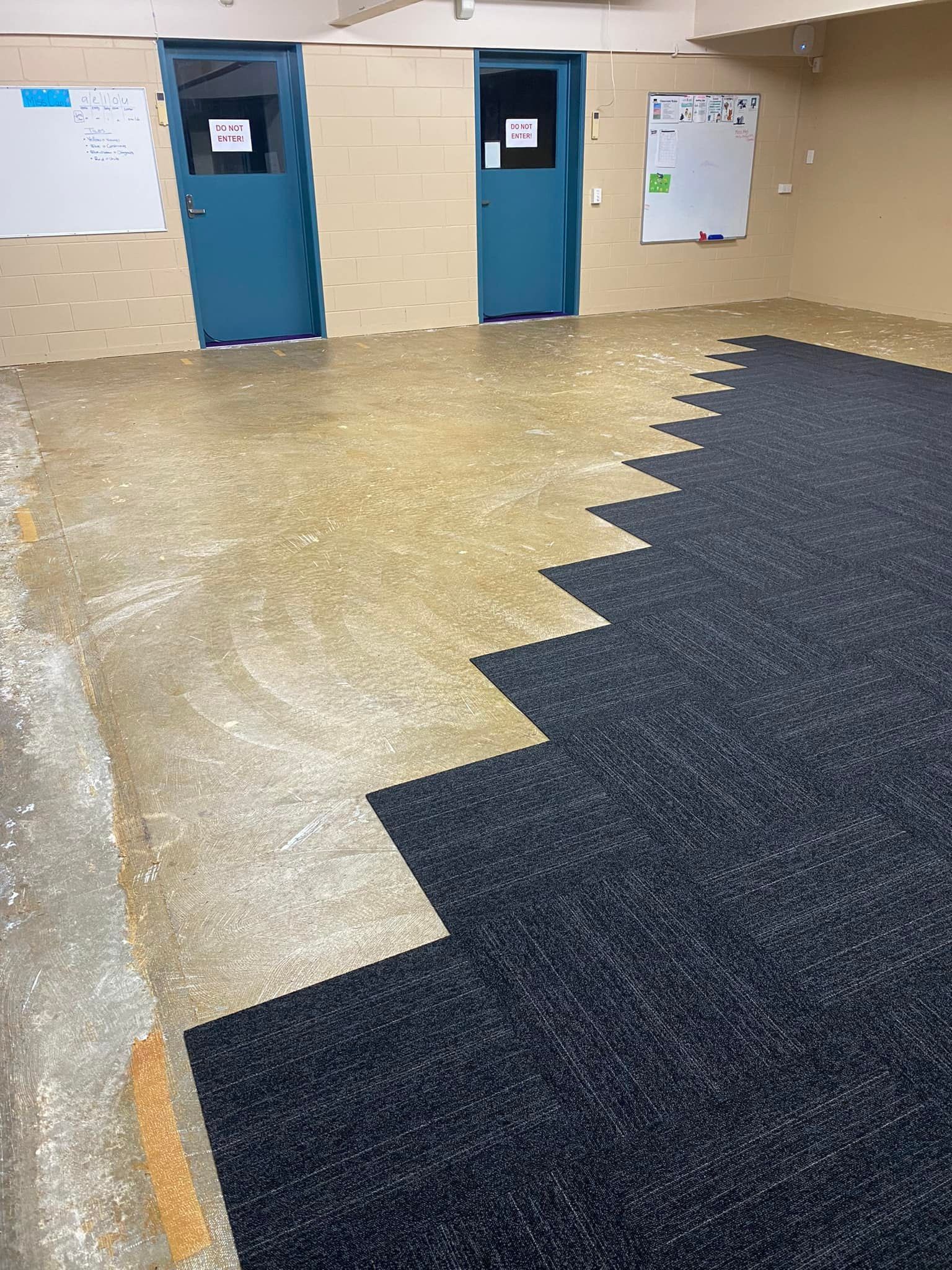 Room With Gold Flooring And A Black Carpet — Mareeba Floor Covering Centre in Cooktown, QLD