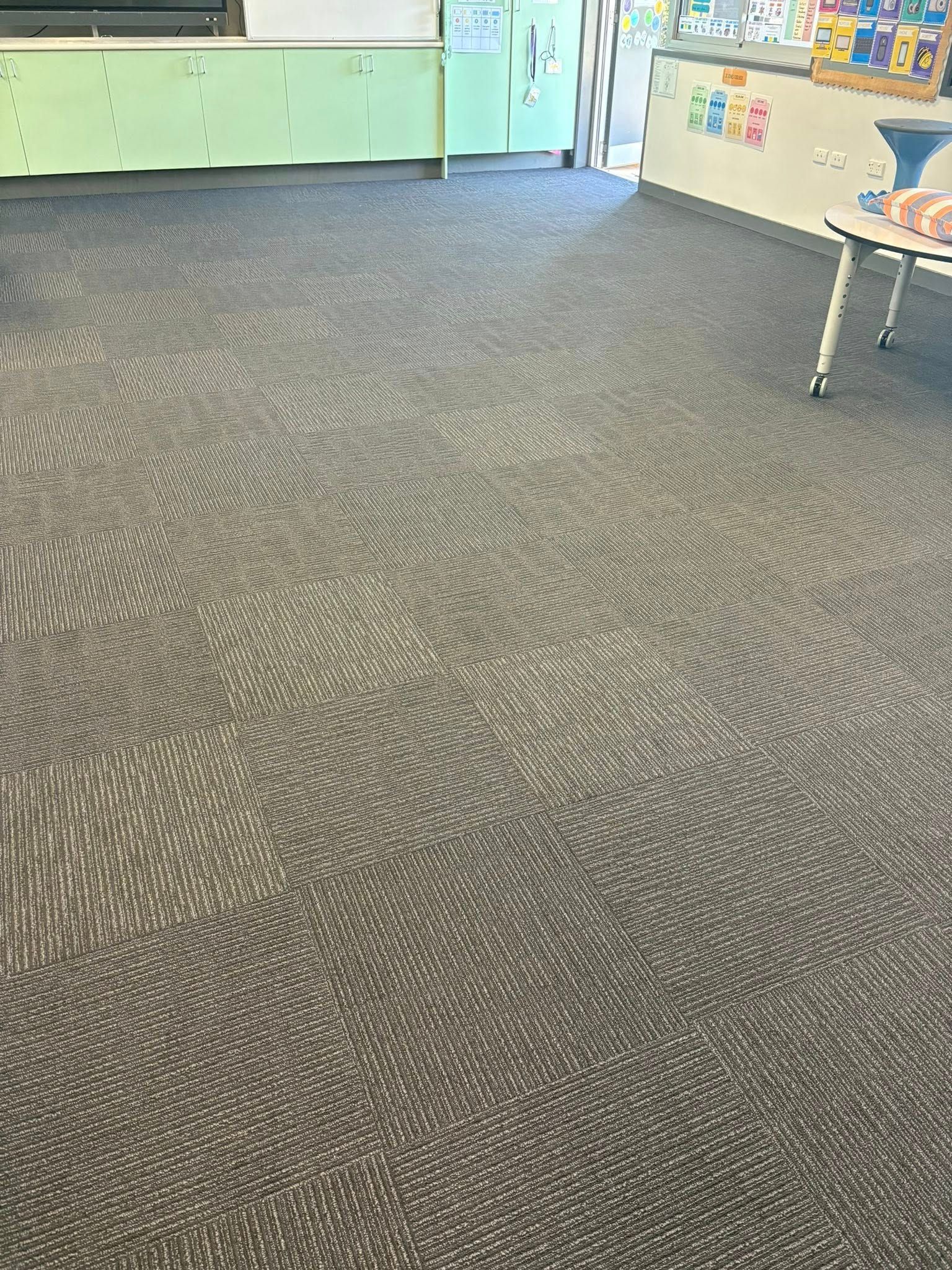 Empty Room With Gray Patterned Carpet — Mareeba Floor Covering Centre in Mareeba, QLD