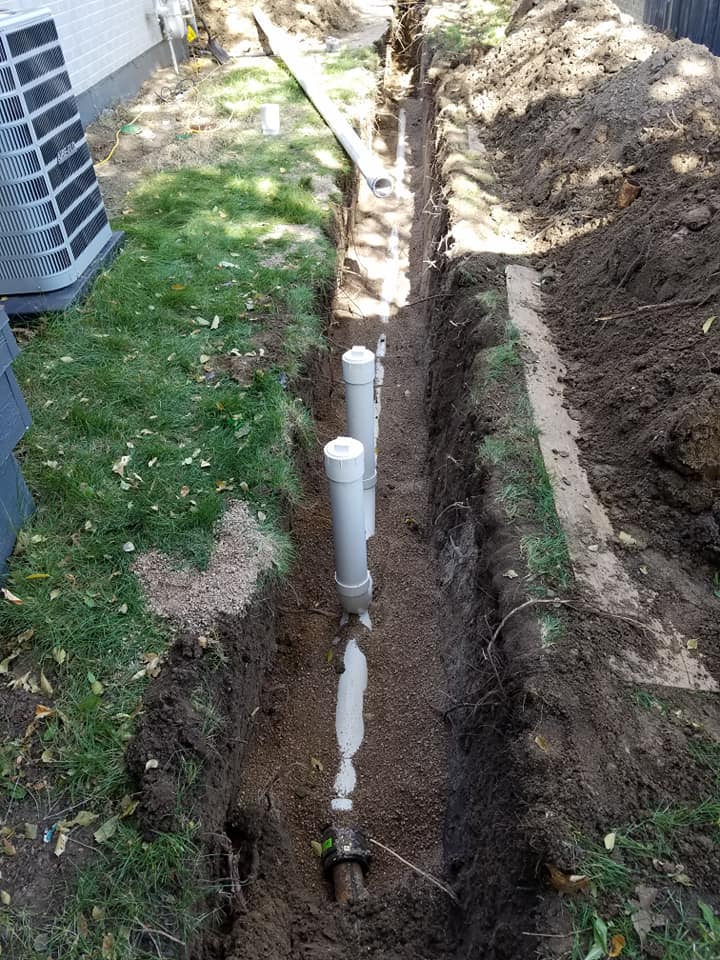 Pipe Installed On Backyard — Littleton, CO — An Affordable Plumber