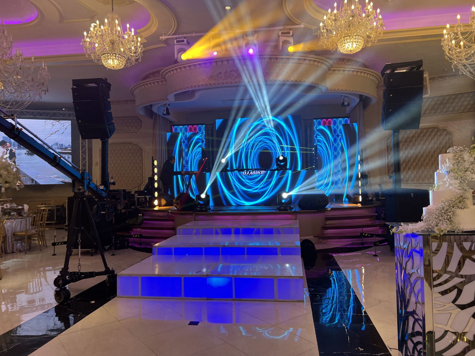 LED Video Wall and A large room with a dance floor and a large screen.