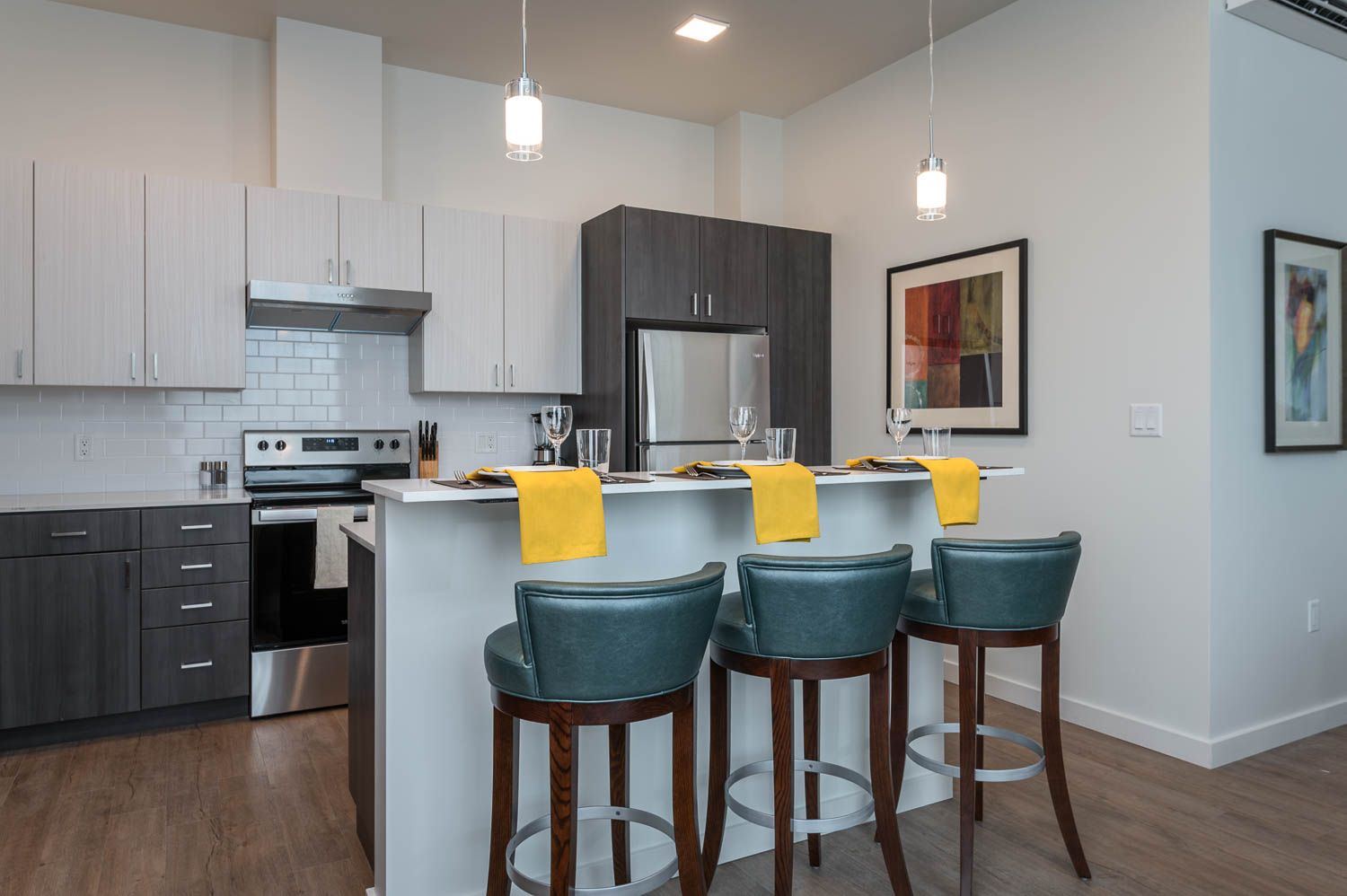 photo of kitchen with blue bar stools