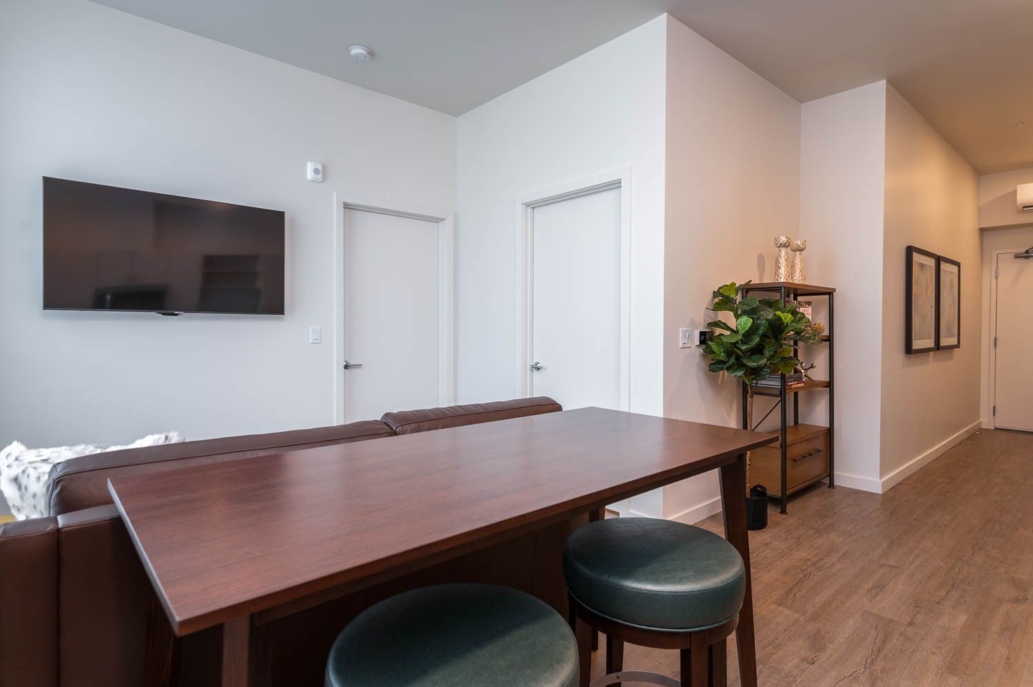 photo of kitchen counter with blue bar stools