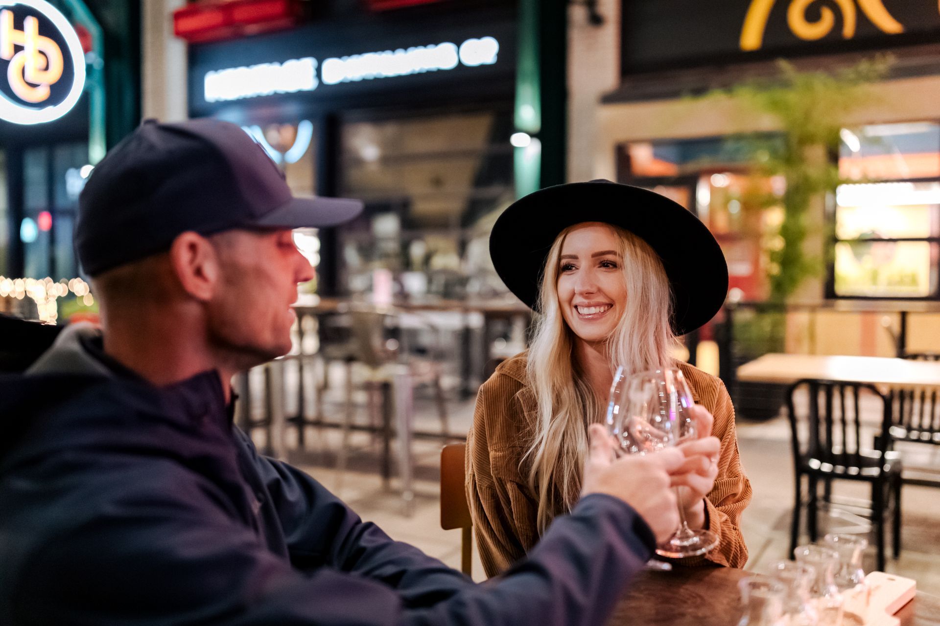 Photo of two people drinking wine
