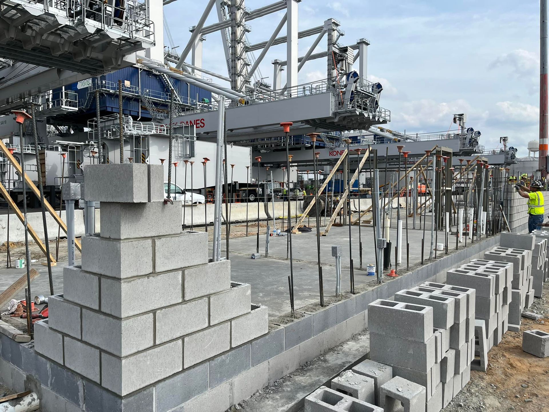 A construction site with bricks stacked on top of each other.