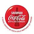 The savannah coca cola bottling company logo is a red button with a coca cola bottle on it.