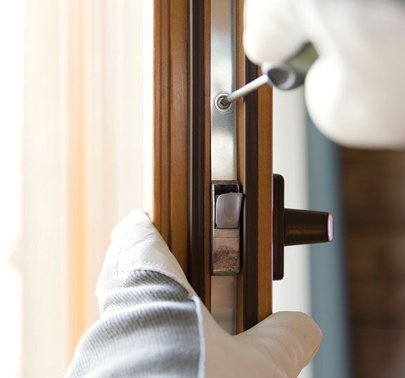 Fixing Door Lock — Windham, ME — Superior Lock & Key Inc.