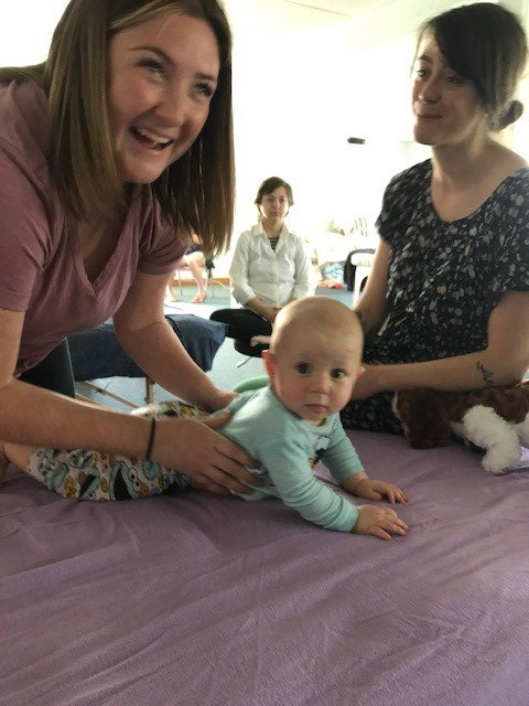 Acupressure — Man Holding a Baby in Waldoboro, ME