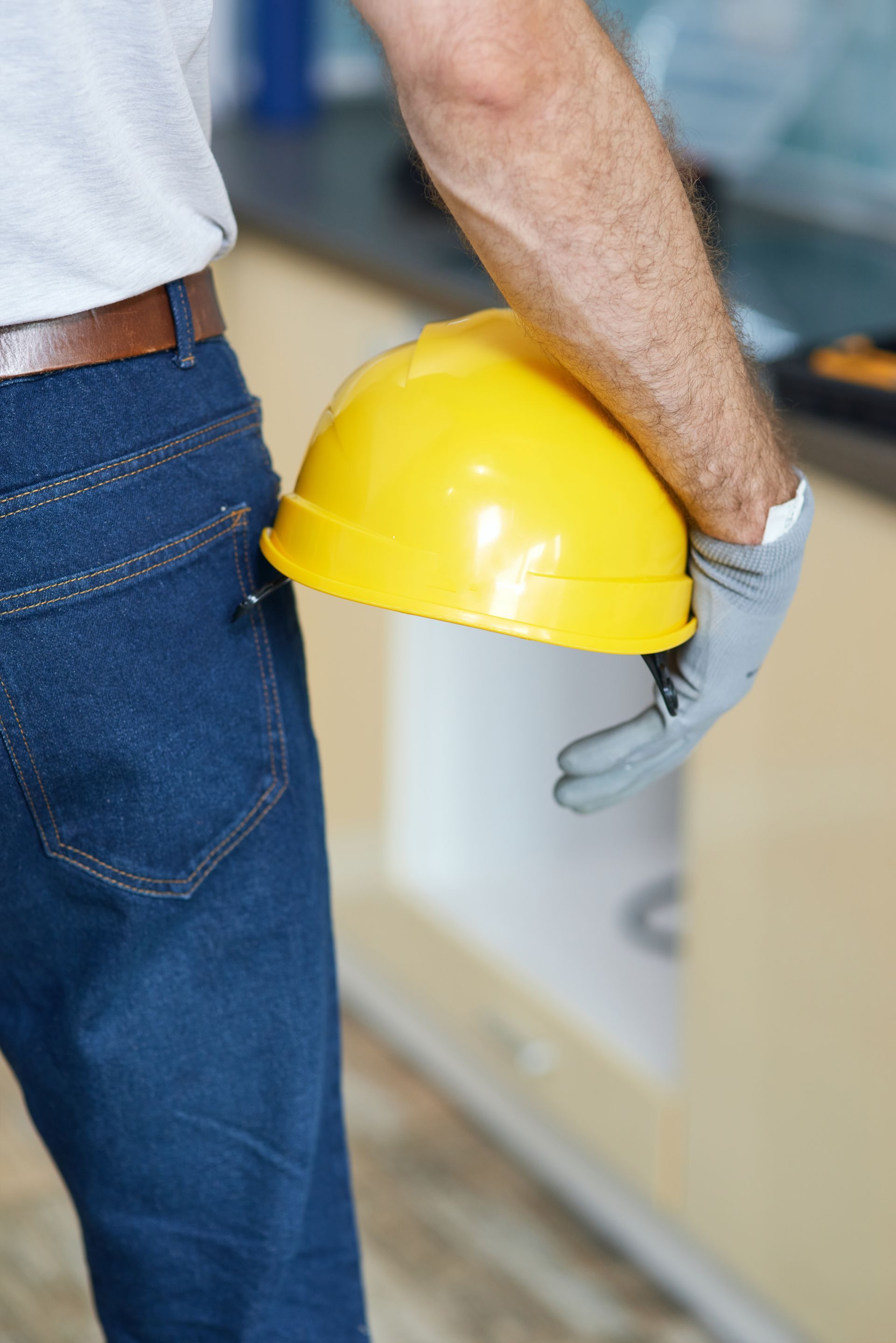 close up of construction worker with worker helmet