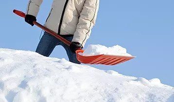 man shoveling snow