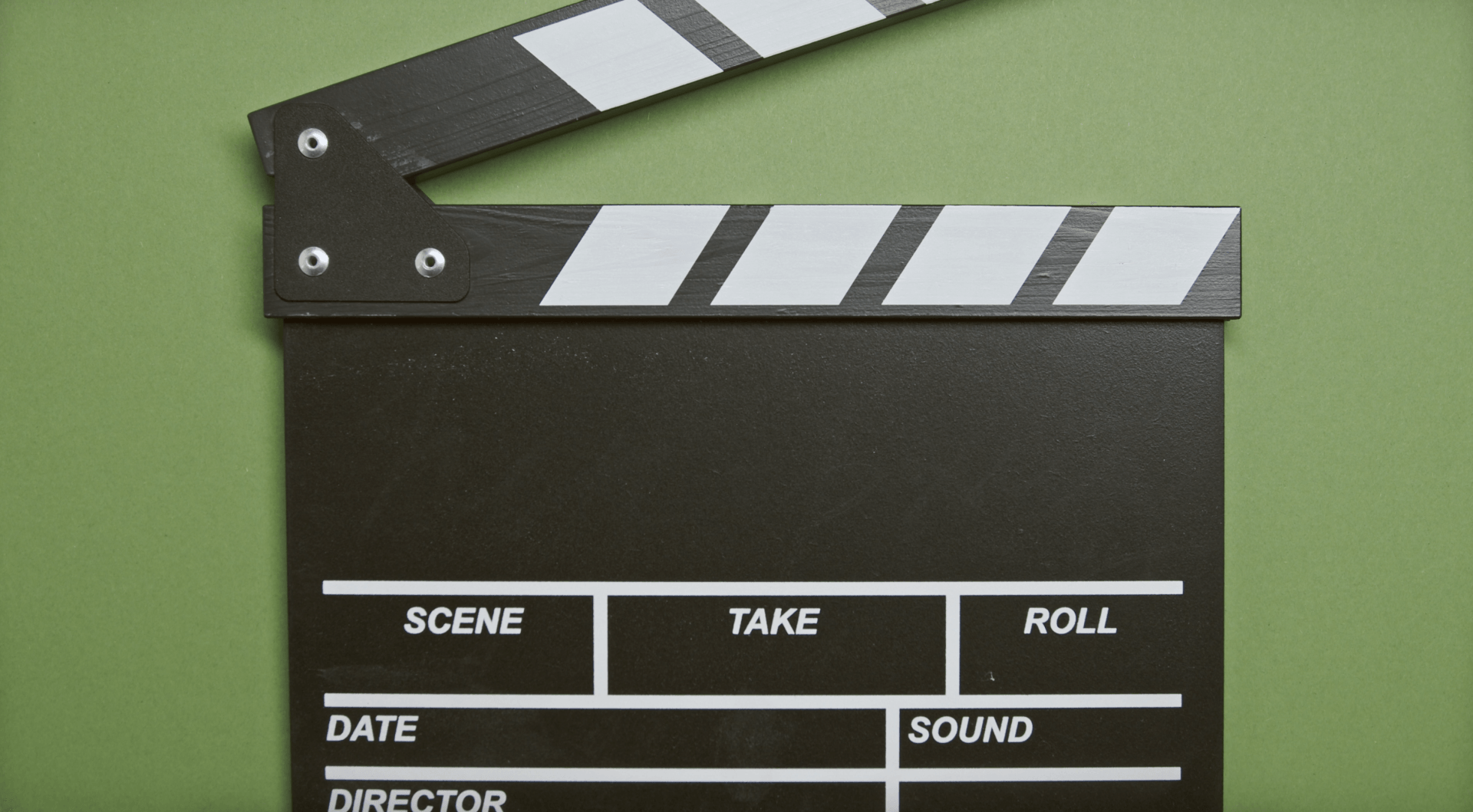 Clapperboard, open against a green background; black with white stripes.