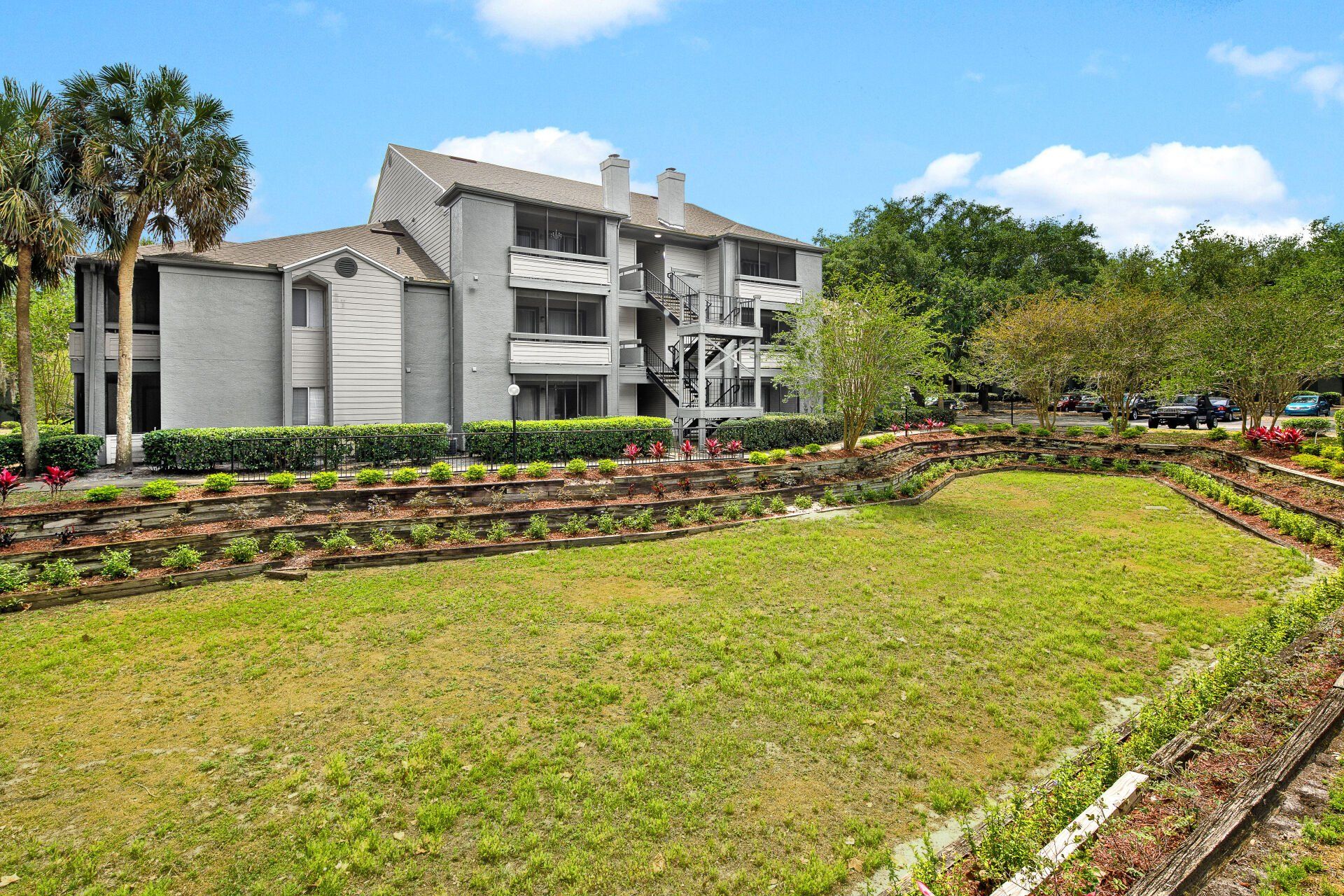 1801 Metrowest  building with a large lawn in front of it.