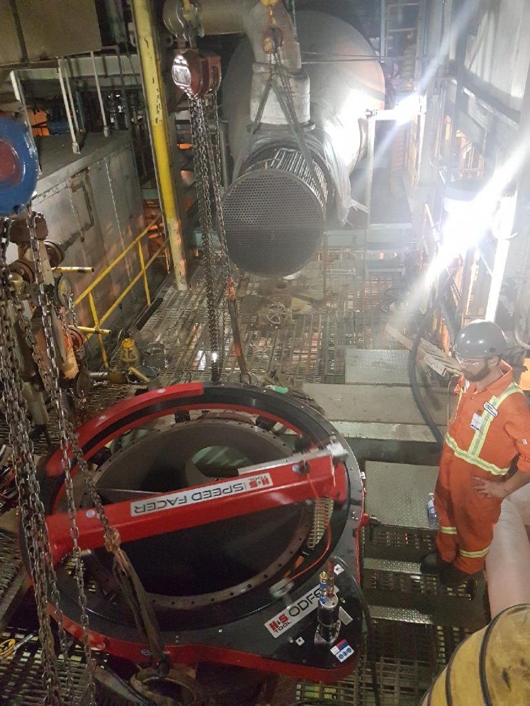 Basic Machining's staff repairing a flange at Domtar Mill