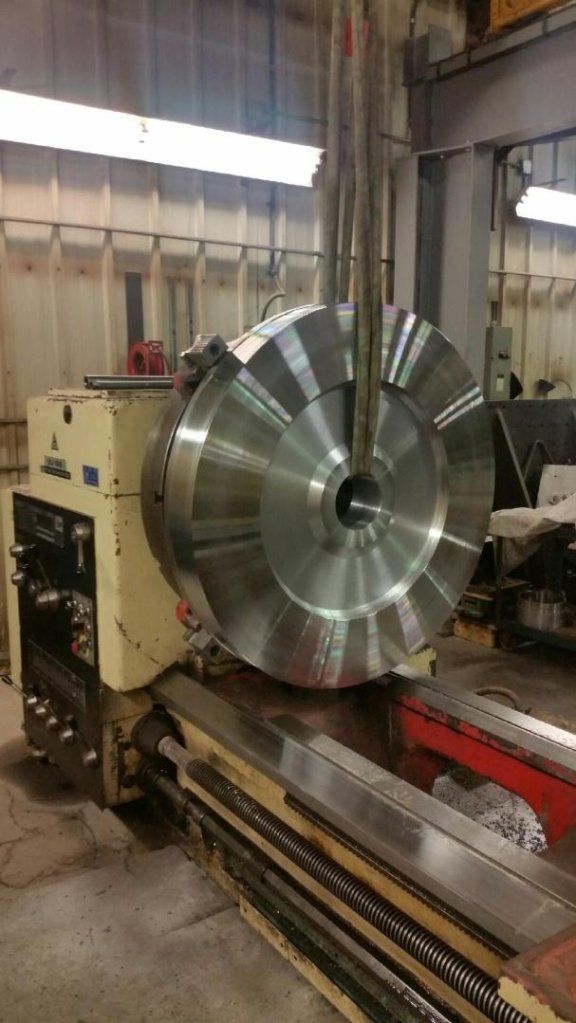 Rock crusher fly wheel