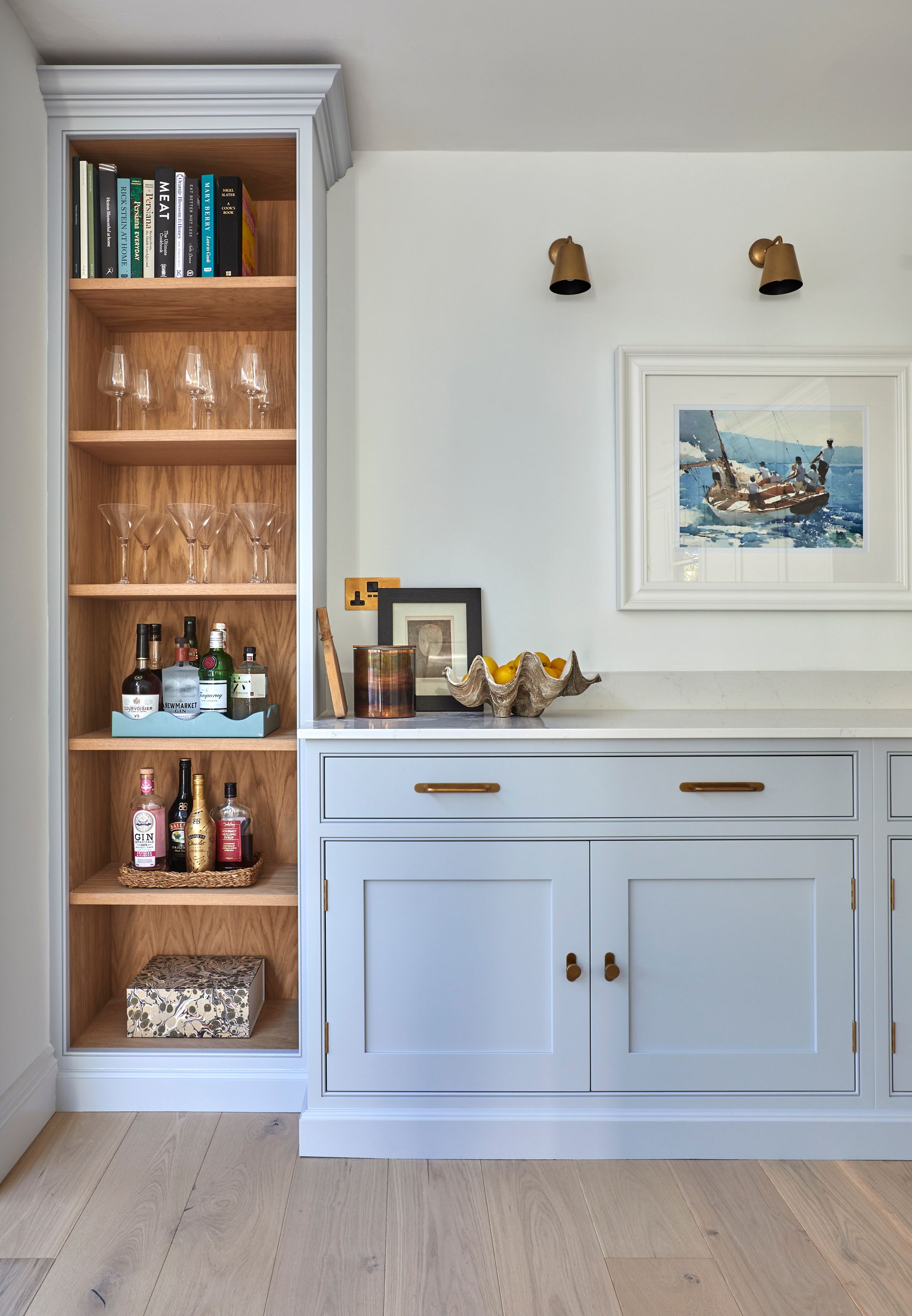 a kitchen with a large island and stools