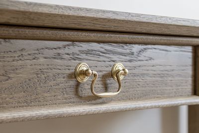 a wooden drawer with Chardome bespoke furniture written on it