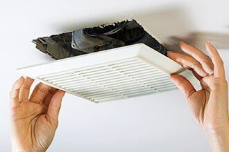 Heating and Cooling — Removing Fan Vent Cover in Greensburg, PA
