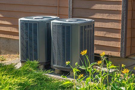 Air Conditioner Maintenance — Air Cconditioning Units Outside The House in Greensburg, PA