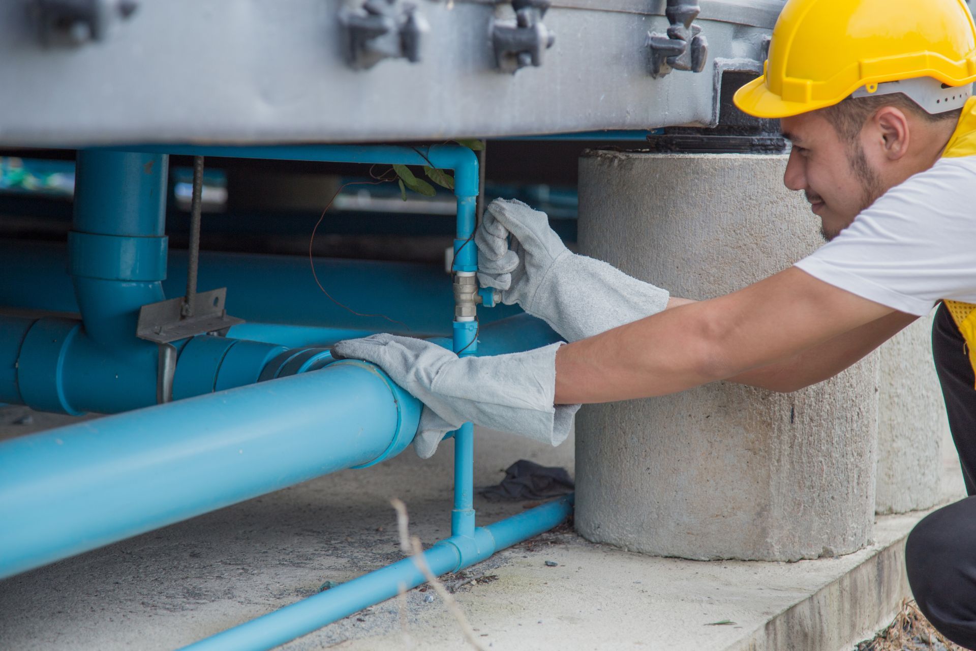 a professional installing a water line