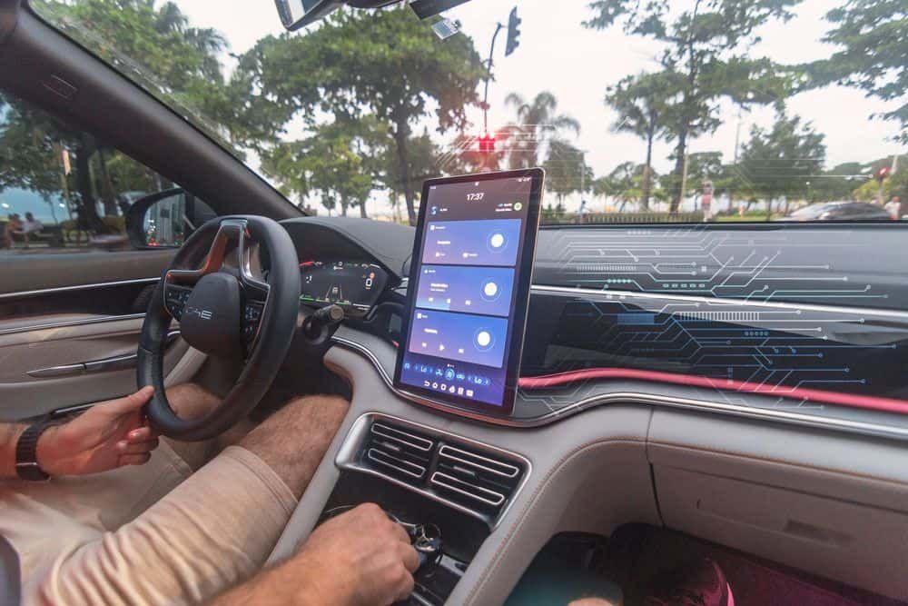 A modern car dashboard featuring a screen an a smart biometric HUD overlay