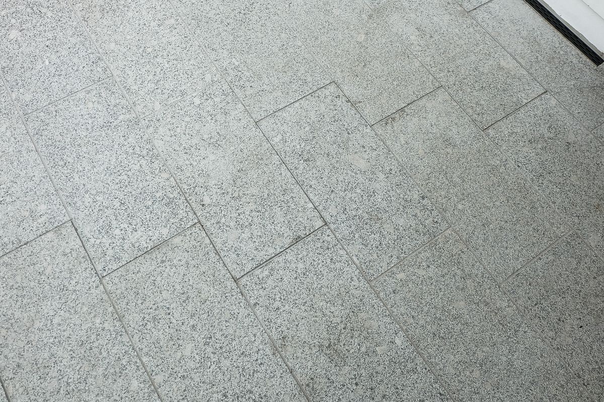 Granite pavers with tight joints and clean edges – Pelham outdoor tiling