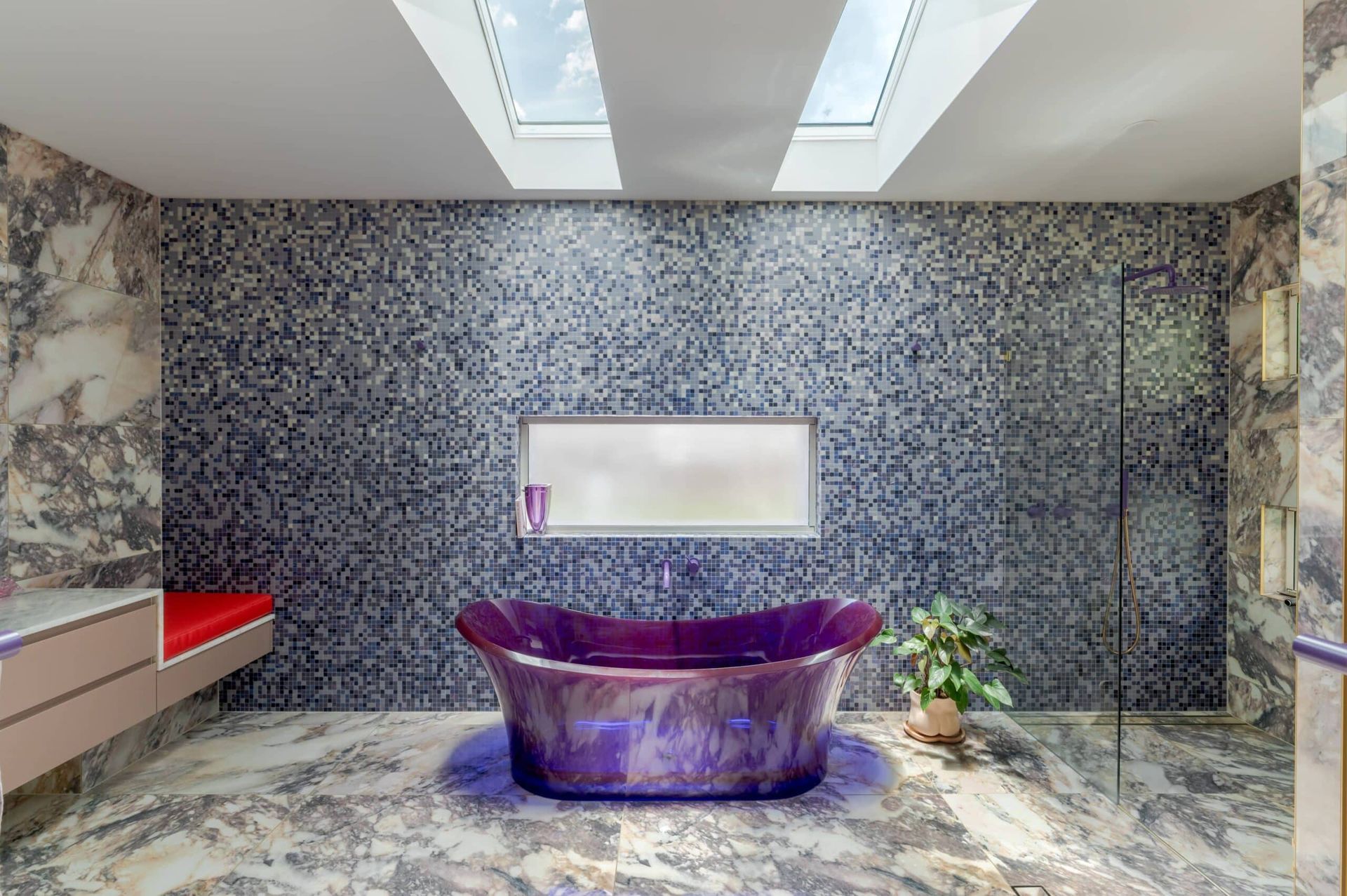 Blue mosaic bathroom with feature tub and stone-look floor – Samford