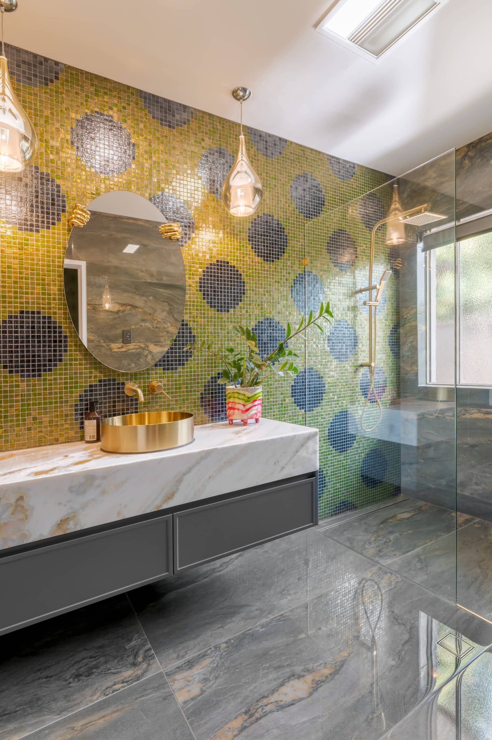 Green and gold mosaic bathroom wall with marble vanity – Samford tiling