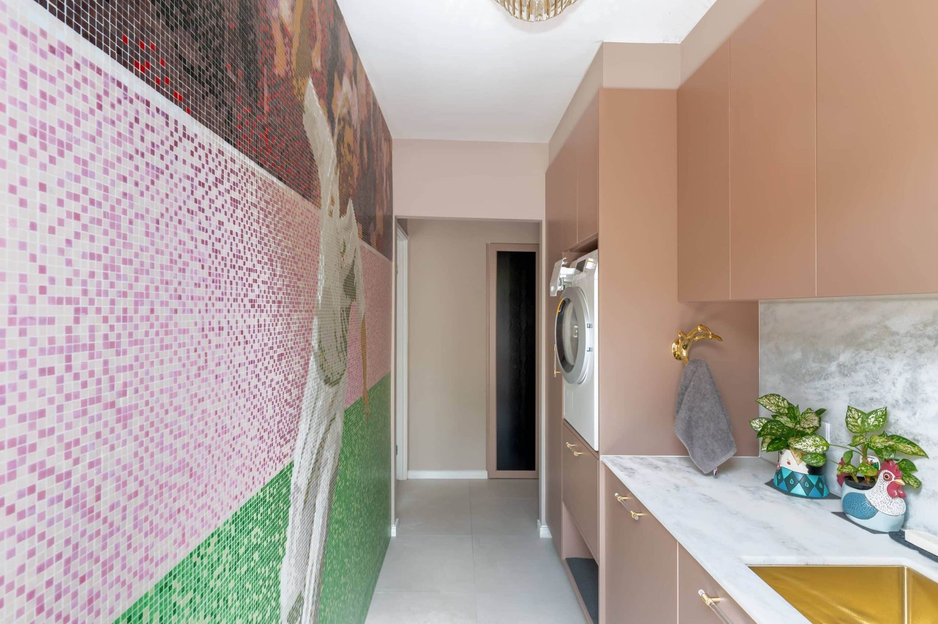 Custom mosaic mural installation with curved tile work – Samford home