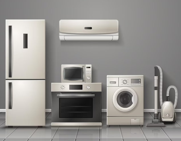 Frigorífico, aire acondicionado, microondas, horno, lavadora y aspiradora contra una pared gris.