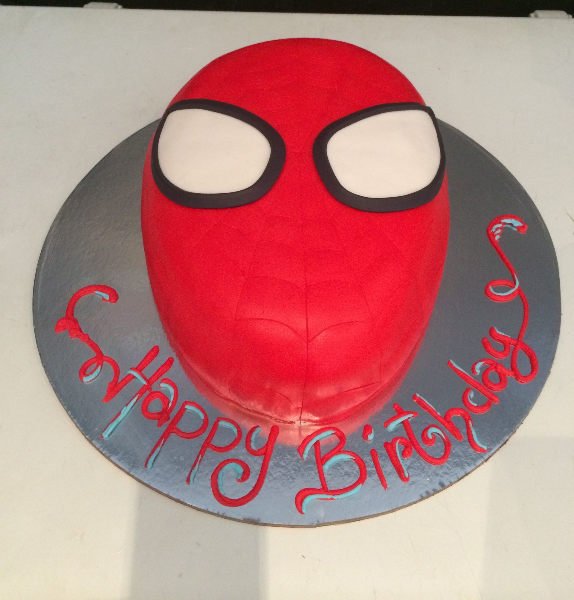 custom cake with spiderman