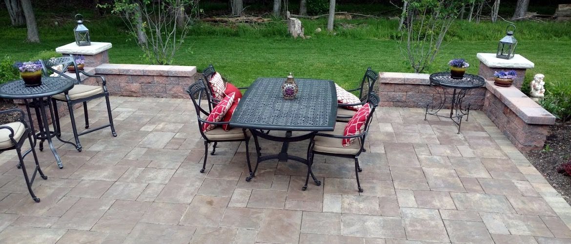 There is a table and chairs on the patio.