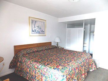 bed with floral print-motel-Pittsburgh, PA