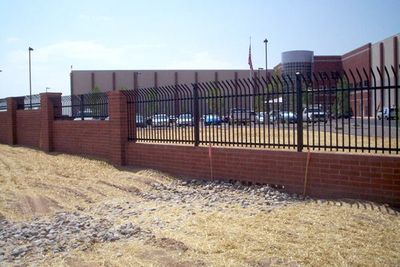 Company Fences — Iron Fences With Brick Wall in Albuquerque, NM