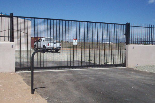Professional Access Control Gate Company — Black Solid Gate of a House in Albuquerque, NM