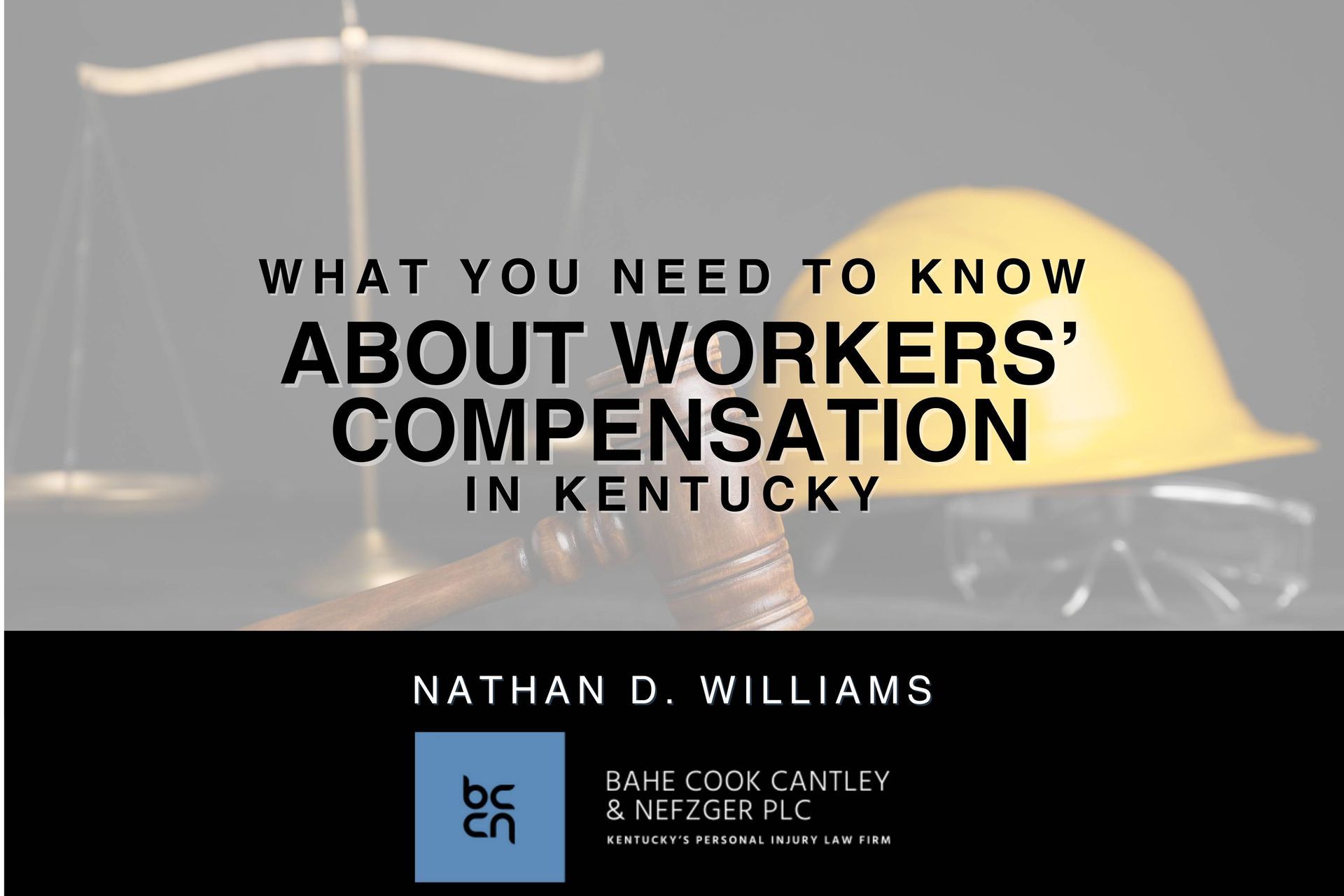  A gavel, scales and construction worker's gear on wooden table at Nathan D. Williams near Campbells