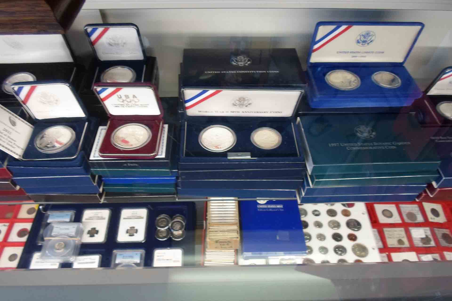 Coins inside the coin album — Cincinnati, OH — Franklin Street Coin Company