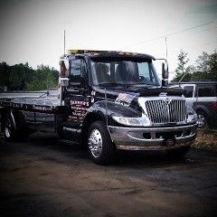 Large black tow truck