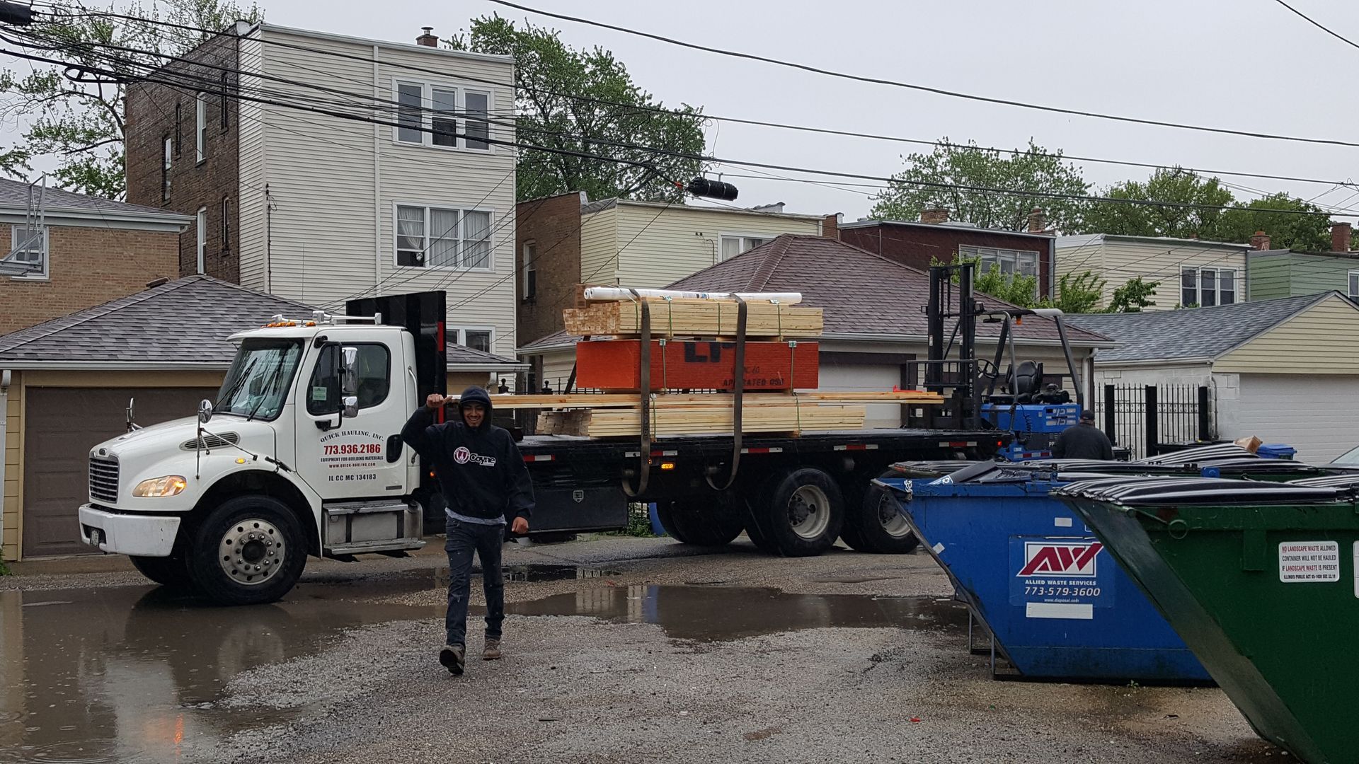 A dumpster with the word law on it
