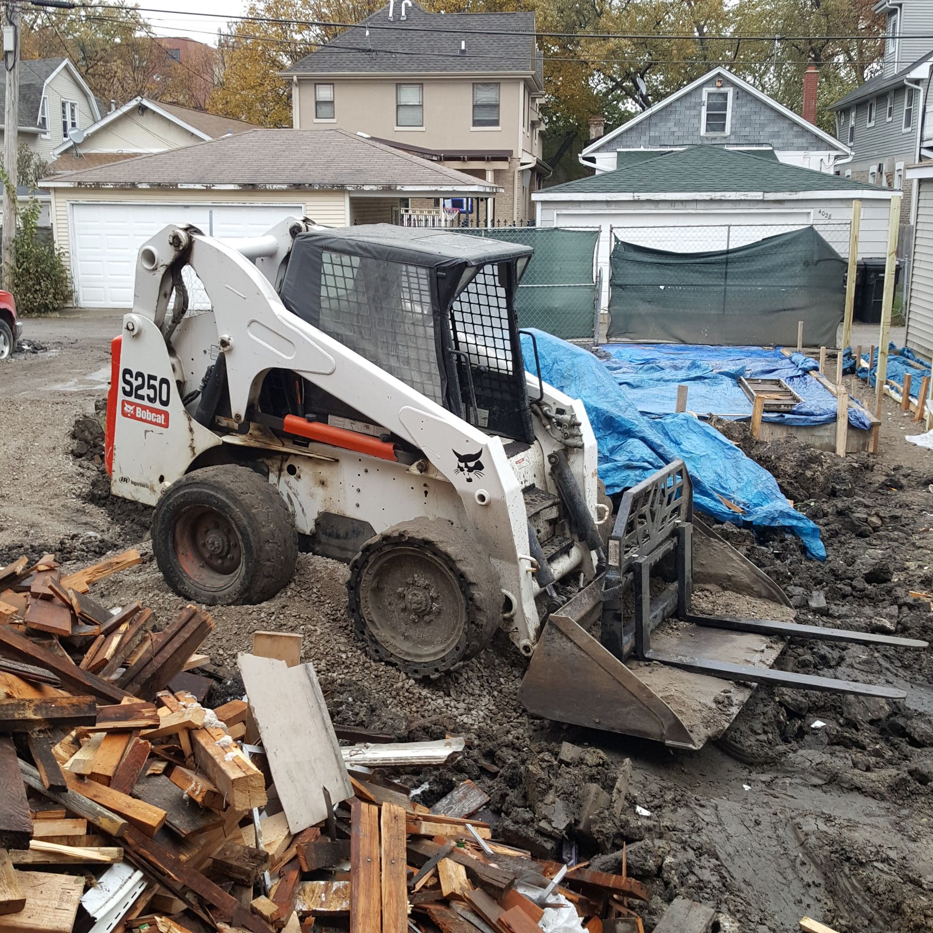 A skid steer with the number 5650 on it