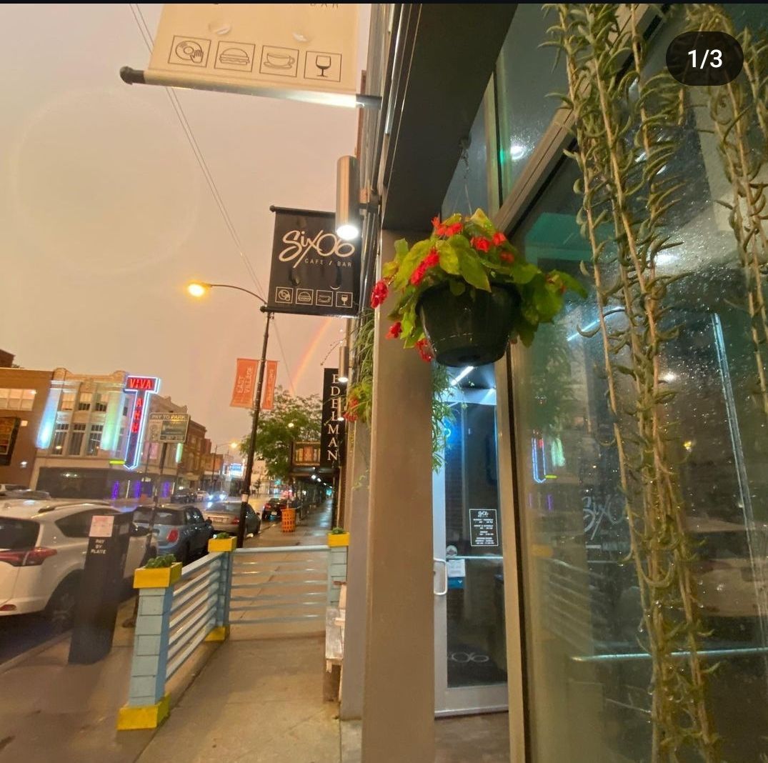 A picture of a store front with a sign that says ' y's ' on it