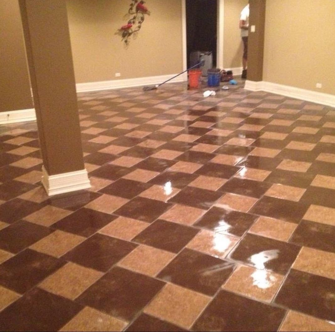 A room with a checkered tile floor