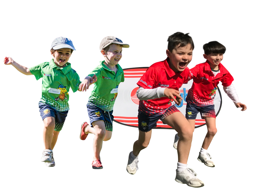 Four children in athletic shirts and shorts running together outdoors, appearing excited.